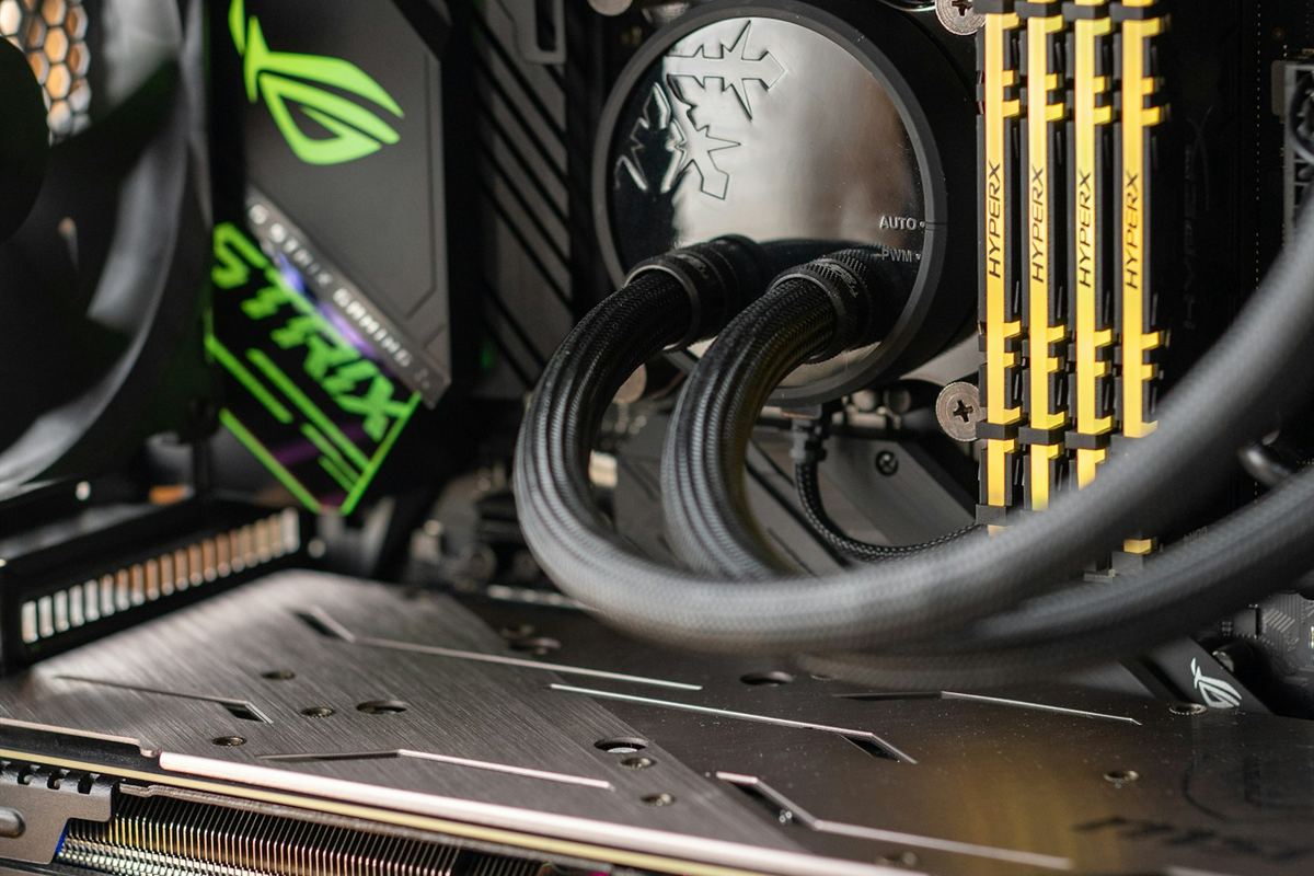 Inside a gaming PC: graphics card, memory modules and a liquid cooler.